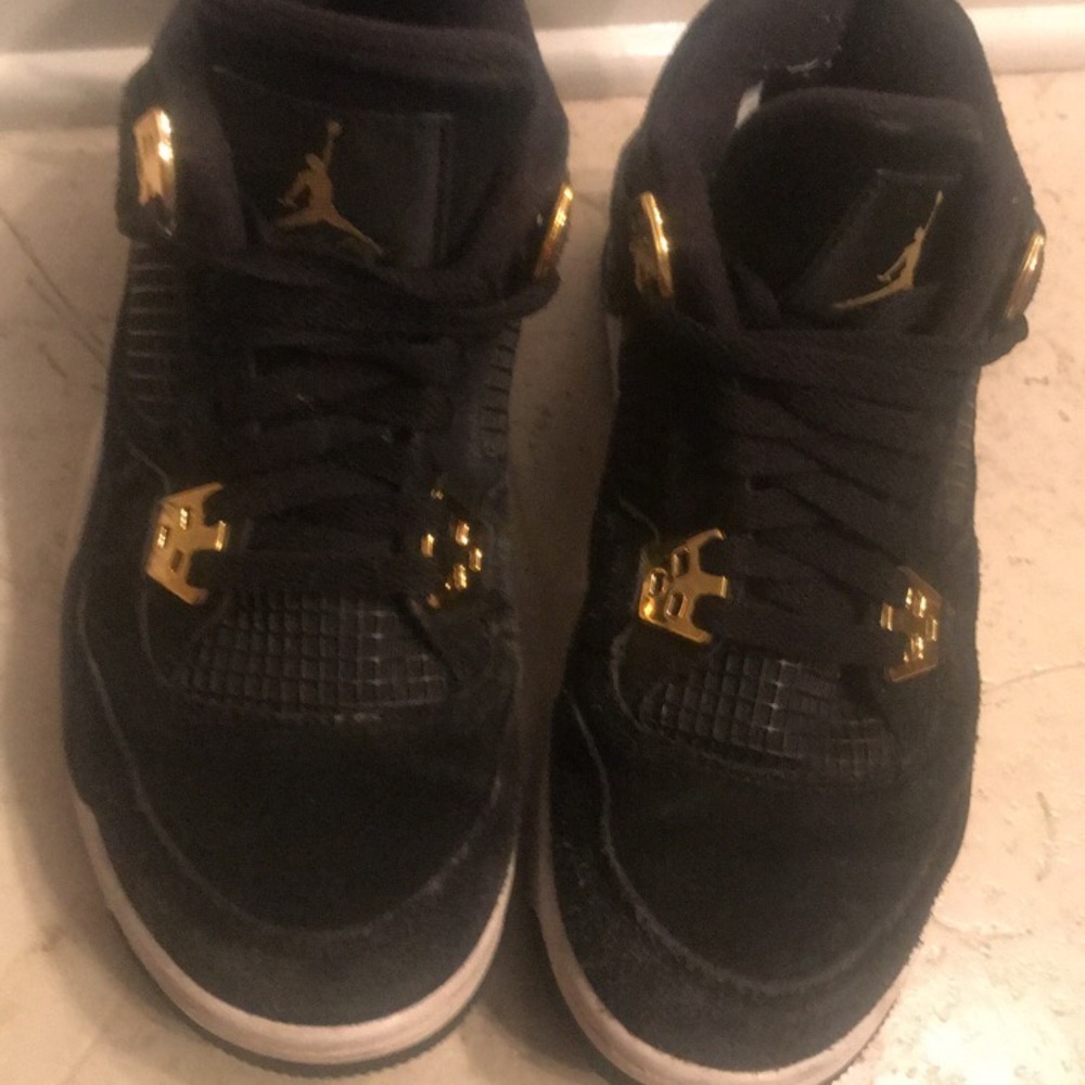 Jordan 4s Black and gold.